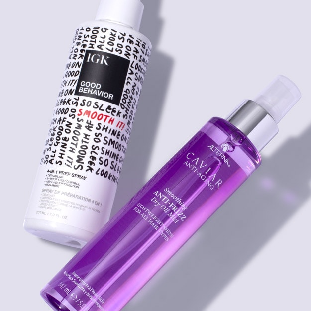 Light purple background featuring Anti-Frizz sprays from Alterna and IGK.