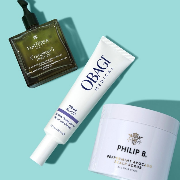 Woman applying face cream