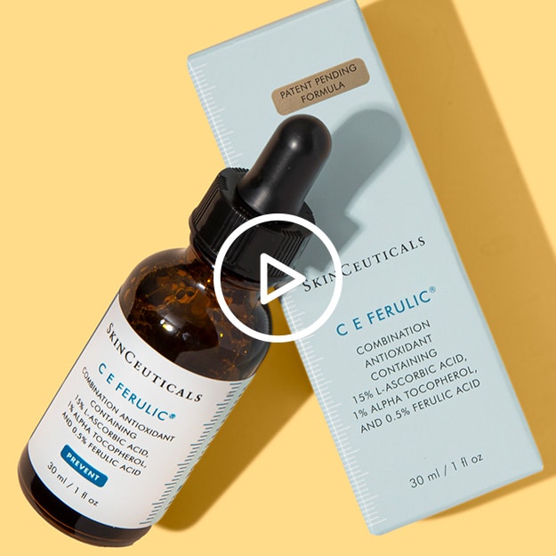 The New Patent-Pending SkinCeuticals C E Ferulic Antioxidant Serum leaning against the box on a yellow background.