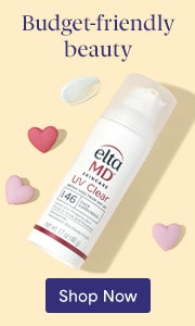 A bottle of EltaMD sunscreen on a pale yellow background with a swatch of white sunscreen, red and pink hearts and a blue Shop Now button.