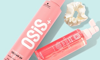 Schwarzkopf OSIS+ and Maria Nila hair care products styled with a scrunchie on a light-colored background.