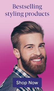 Image of Caucasian male smiling on pink background. Shop Men’s hair care products on LovelySkin.com