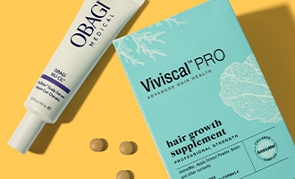 Obagi hair product and Viviscal PRO hair growth supplement displayed on a light background.