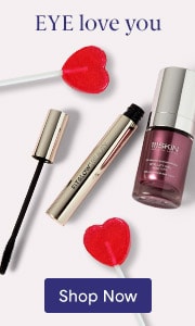 Eye love you featuring mascara and eye treatment with red hearts and Shop Now button.