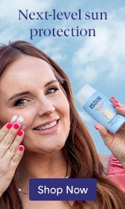 Model applying ISDIN Fusion Water Magic SPF outside. Shop sun protection on LovelySkin.com