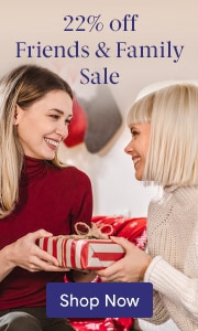 Two women exchanging a Christmas present, promoting a 22% off Friends & Family Sale.