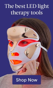 Woman wearing red and white LED light therapy face mask with text the best LED light therapy tools.