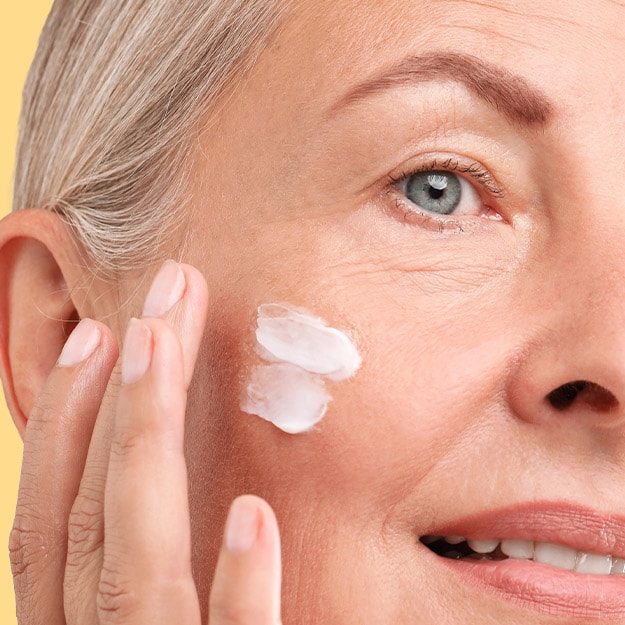 Various scalp treatment products on a teal background